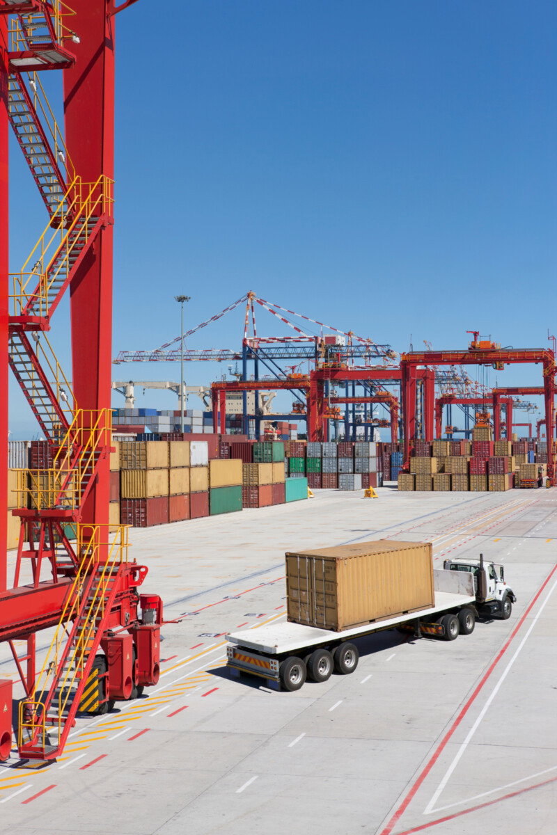 Vertical shot of a dockyard with a lorry carrying 2025 10 17 00 12 46 utc